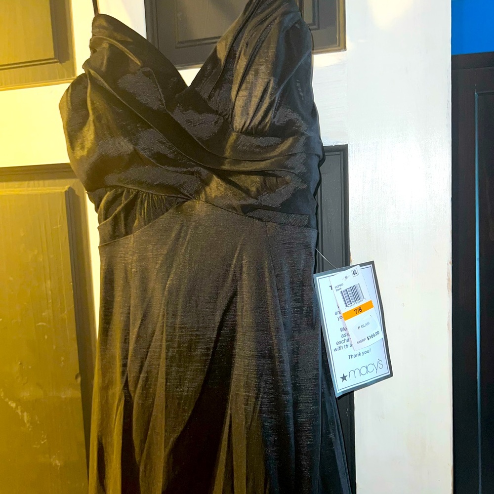 Black prom dress with a bow tie back size 7/8 Never Worn